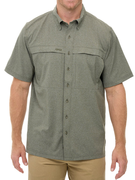 Agave MicroTek Shirt shown in a soft blue-green tone with matching buttons and tonal embroidered GG logo. Features include a vented back yoke, short sleeves, hidden zippered chest pockets, and a button-down collar. 