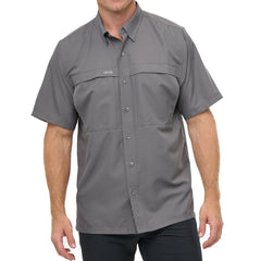 Man wearing GunMetal gray GameGuard Original short sleeve shirt with chest vents and GG logos; breathable, quick-dry performance for outdoor wear.