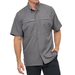 Man wearing GunMetal gray GameGuard Original short sleeve shirt with chest vents and GG logos; breathable, quick-dry performance for outdoor wear.
