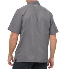Man wearing GunMetal gray GameGuard Original short sleeve shirt with chest vents and GG logos; breathable, quick-dry performance for outdoor wear.