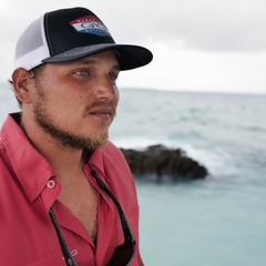 Lava Rock Explorer Shirt-GameGuard - man fishing on the water wearing red shirt that is lightweight and stylish